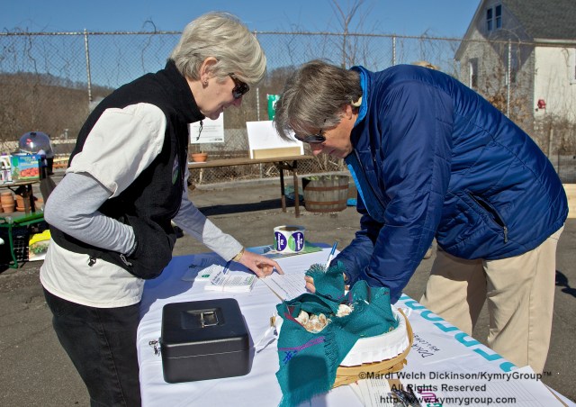 Homeowner signs up for Assessment with Energize Bedford. Bedford 2020 VegOut Event held at the Mt. kisco Elelmentary School Community Garden, Mt Kisco, NY. April 6, 2013. ©Mardi Welch Dickinson/ Kymry Group. All Rights Reserved.
