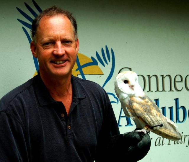 Alexander R. Brash, Connecticut Audubon Society's new president, holding a Barn Owl used for CAS education programs.  ©Connecticut Audubon Society