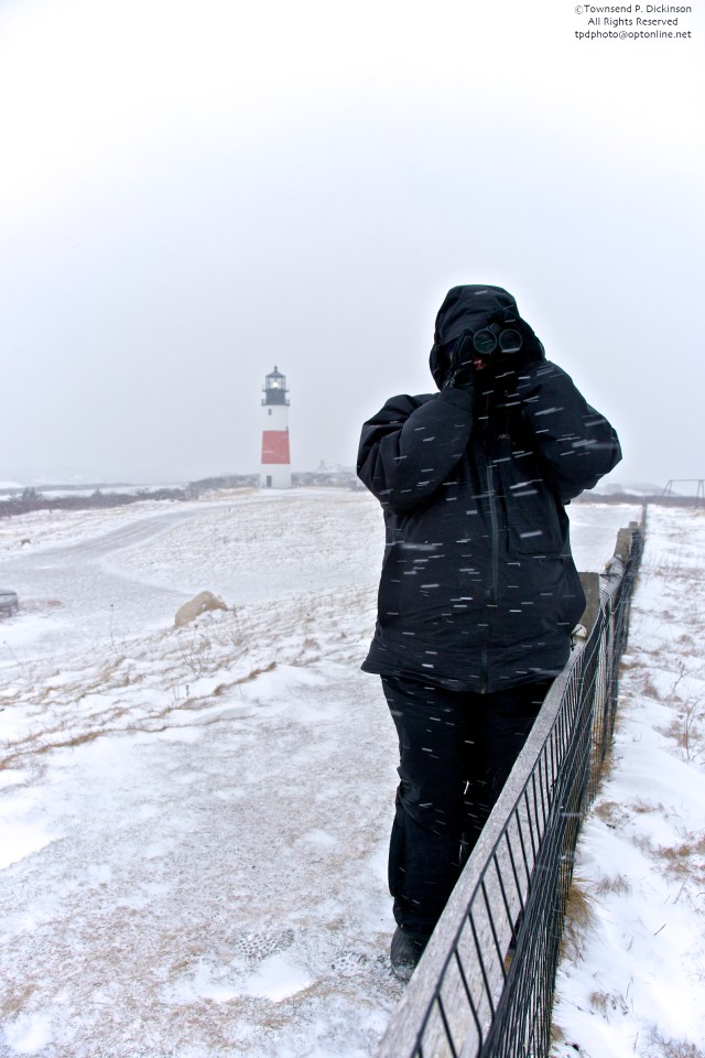 Mardi Dickinson photographing Sankaty Head lighthouse January 2010. Nantucket Island MA. ©Townsend P. Dickinson. All Rights Reserved.