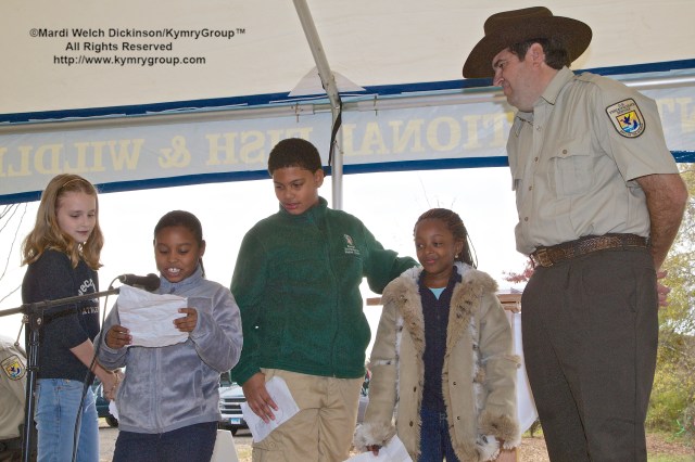 Students from The Barnard Environmental Studies Magnet School  reads a letter of thanks and talks about the importance of what this Urban Oases means to them. ©Mardi Welch Dickinson/KymryGroup. All Rights Reserved. National Wildlife Refuge Partnership, West River Memorial Park, New Haven, CT on October 30, 2013.