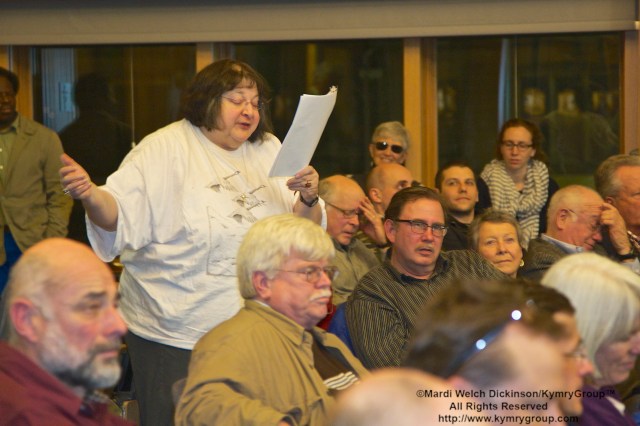 Audience member reads a poem she wrote about the Passsenger Pigeon Joel Greenberg, author talk on "A Feathered River across the Sky. The Passenger Pigeon's Flight To Extinction" at Yale School of Forestry & Environmental Studies. New Haven, CT. March 12, 2014. ©Mardi Welch Dickinson/KymryGroup. All Rights Reserved.