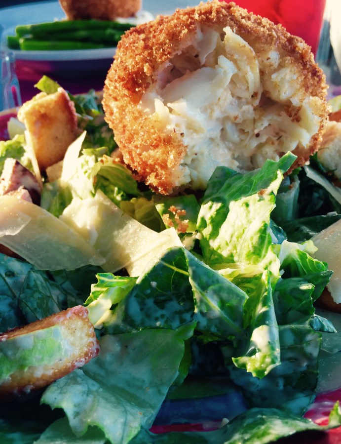 Gillian's Restaurant and Bar Historic Lewes, Delaware. Crab Cake with caesar salad & dressing, . ©Mardi Welch Dickinson/ KymryGroup™ All Rights Reserved.